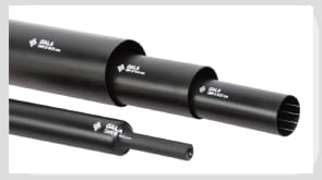 Four lengths of black medium and heavy wall heat shrink tube in increasing diameters, each printed with the manufacturer's mark